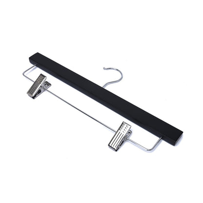 Umeraș pentru pantaloni din lemn negru cu clipsuri metalice - ideal pentru pantaloni și fuste - HUMERO